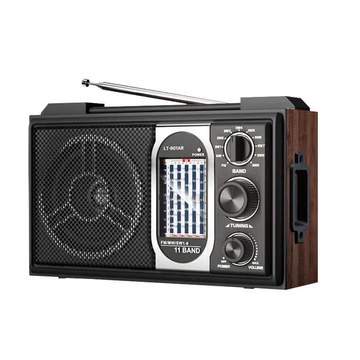 Radio vintage rechargeable avec haut-parleur intégré et design rétro.